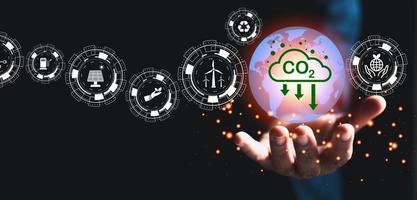 Footprint with Reduce CO2 emission concept. Sustainable development and green business based on renewable energy. Renewable energy-based green businesses can limit climate change and global warming. photo