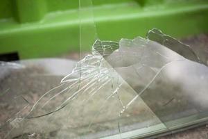 Broken glass. Shards of glass in building. Damaged window. photo