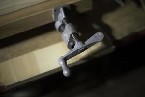 Fasteners for board. Fastening details. Wood workshop. photo