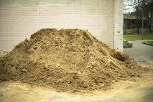 Pile of sand. Building material. photo