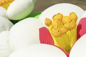 Inflatable flower. Decoration of holiday. Rubber flowers. photo