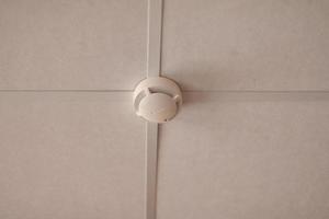 Fire protection system on ceiling. Smoke detector. photo