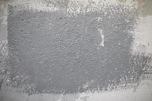 Wall is in gray paint. Texture of wall of building. photo