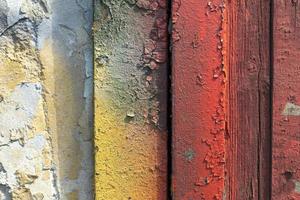 Boards in paint. Old wall. Surface texture of different colors. photo