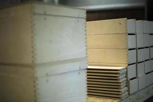 Boxes made of wood. Drawers in carpentry workshop. Woodwork. photo