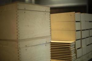 Boxes made of wood. Drawers in carpentry workshop. Woodwork. photo