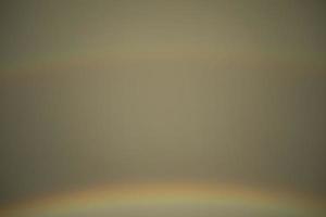 Rainbow in sky. Heavenly background. Texture of clouds in rain. photo