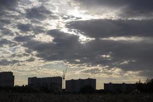 Landscape of a modern city. Evening in a large urban area. photo