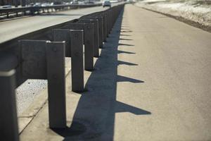 Road bumper on highway. Protection on highway. Side of road. photo