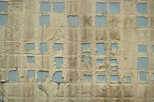 Tile texture. Old wall. Details of Soviet architecture. Squares of tiles. photo