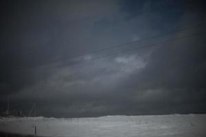 Gray landscape in winter. View of grey clouds. photo