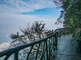 Walkway balcony on the Tianmen mountain cilff with beautiful White cloud and sky at zhangjiajie city China.Tianmen mountain the travel destination of Hunan zhangjiajie city China photo