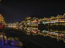 Scenery view in the night of fenghuang old town .phoenix ancient town or Fenghuang County is a county of Hunan Province, China photo