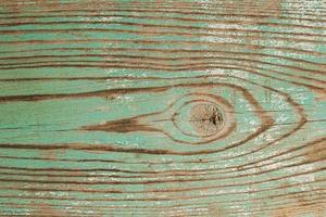 The turquoise and white textured wooden background. photo