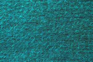 Turquoise and black wool fabric texture for background, closeup. photo