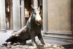 Florence, Italy - Circa January 2022 -the antique pig statue, symbol of good luck. photo