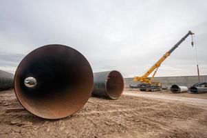 The large pipes at construction site photo