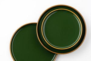un juego de placas de cerámica verde sobre un fondo blanco. vista superior foto
