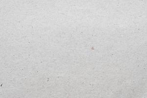 White beige paper background texture light rough textured spotted blank copy space background photo