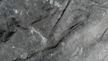 Abstract and blurred of pattern on the black and gray background is split into lines. for background and textured. photo