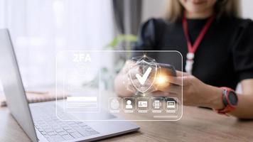 2FA increases the security of your account, Two-Factor Authentication laptop screen displaying a 2fa concept, Privacy protect data and cybersecurity. photo