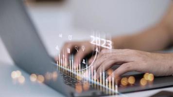 Business and Technology target set goals and achievement in 2023 new year resolution statistics graph rising revenue, planning to start up strategy, icon concept photo
