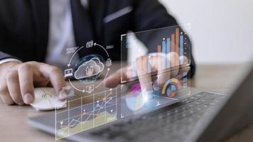 Analyst working with Business Analytics and Data Management System on computer, make a report with KPI and metrics connected to database. Corporate strategy for finance, operations, sales, marketing. photo