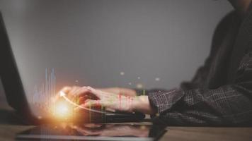 Startup concept with icon business and network connection on modern virtual interface from Laptop photo
