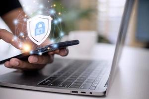 Cyber security. Data protection concept. Banking security. Hands touching digital icon padlock and network connection on mobile smartphone, virtual interface screen. photo