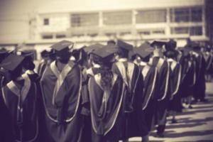 Graduates are walking in line to get your degree,monotone.Vintage color photo