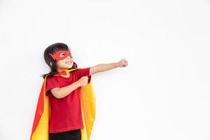 Child acts like a superhero to save the world photo