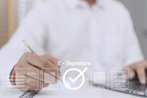 Online business contract Electronic signature, e-signing, digital document management, paperless office, signing business contract concept. photo