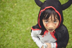 Happy Halloween The cute little girl in Halloween costume photo