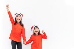 Merry Christmas. Children cheerful celebrate Christmas.  Siblings are ready to celebrate Christmas or meet new year. photo