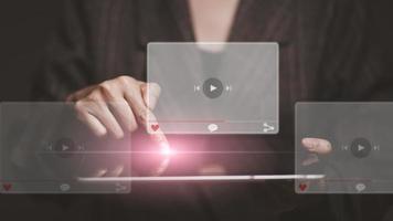 hands of women using tablet for streaming online, watching video on internet, live concert, show or tutorial photo