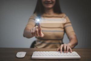 Data Search Technology Search Engine Optimization. woman's hands are using a computer keyboard to Searching for information. Using Search Console with your website photo