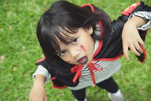 Happy Halloween The cute little girl in Halloween costume photo