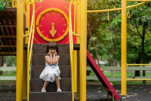 Happy cute kids having fun at playground photo