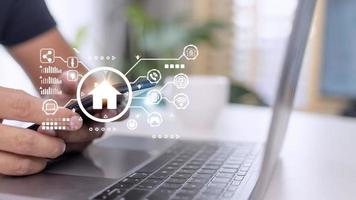 Smart home control with Smartphone,Lifestyle of person in modern life internet of things, Smart house technology.The new innovation of the Future. photo