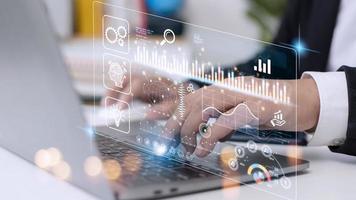 Data scientists. Man programmer using laptop analyzing and development at various information on futuristic virtual interface screen. Algorithm. marketing and deep learning of artificial intelligence photo