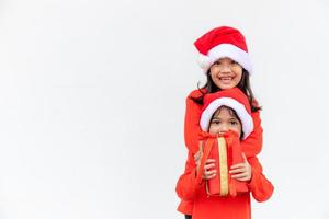 Merry Christmas. Children cheerful celebrate Christmas.  Siblings are ready to celebrate Christmas or meet new year. photo