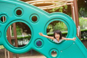 Active little girl on playground photo