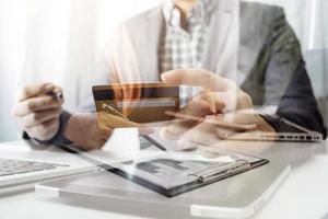 Woman hand using mobile smart phone, online payment, banking and online shopping at the home. photo