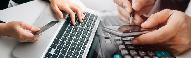 Woman hand using mobile smart phone, online payment, banking and online shopping at the home. photo