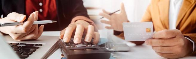 Woman hand using mobile smart phone, online payment, banking and online shopping at the home. photo