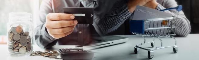 Woman hand using mobile smart phone, online payment, banking and online shopping at the home. photo