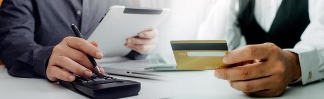 Woman hand using mobile smart phone, online payment, banking and online shopping at the home. photo