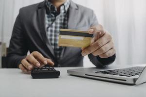 Woman hand using mobile smart phone, online payment, banking and online shopping at the home. photo