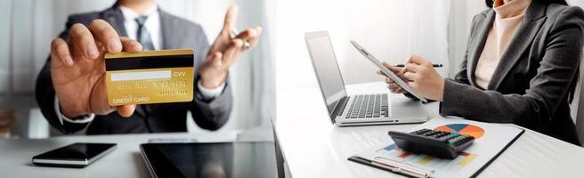 Woman hand using mobile smart phone, online payment, banking and online shopping at the home. photo