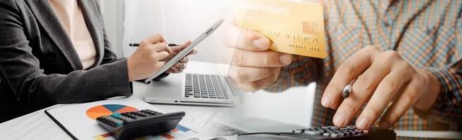 Woman hand using mobile smart phone, online payment, banking and online shopping at the home. photo